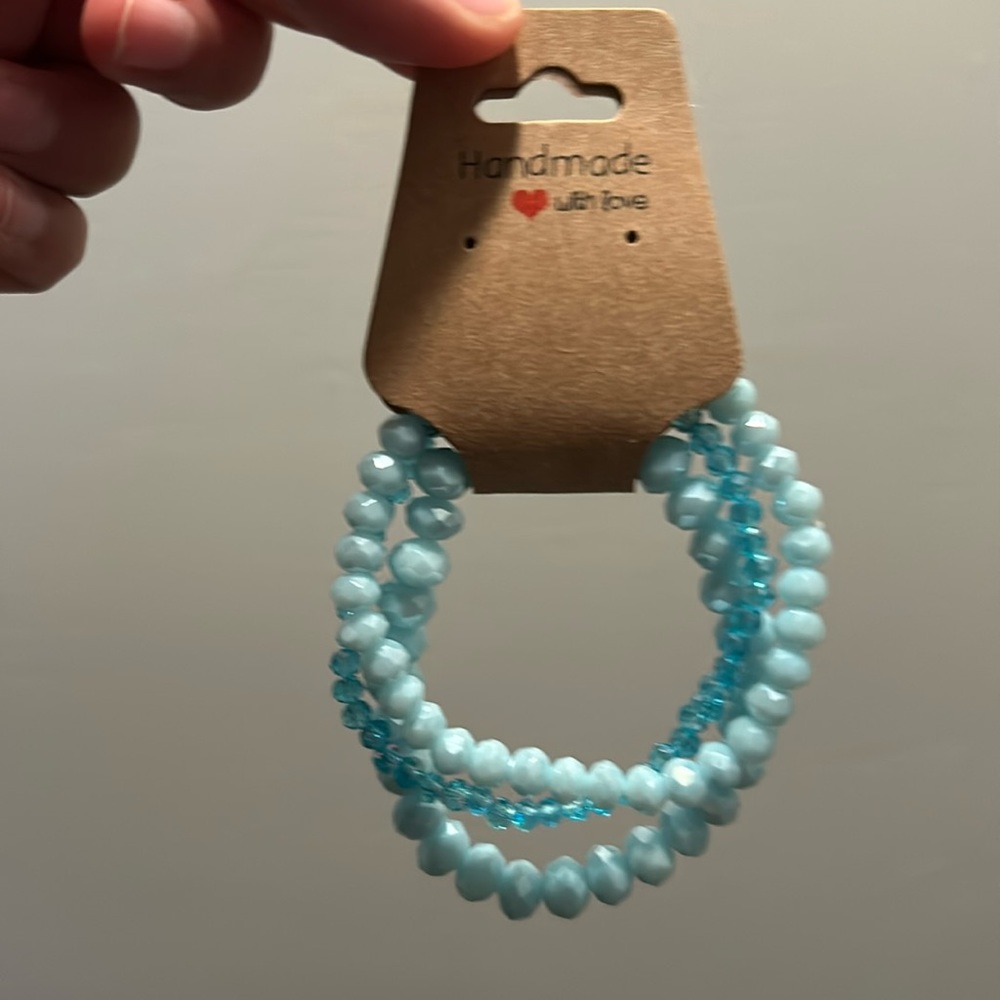 3 blue bracelets